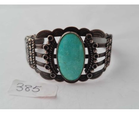 A fancy silver cuff bangle