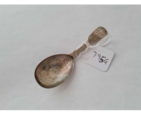 A Georgian caddy spoon with engraved bowl, London 1825, by JB.