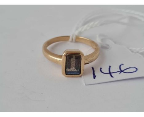 A rectangular blue stone ring 9ct size O - 2.7 gms 