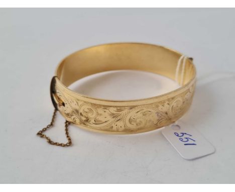 A rolled gold bangle