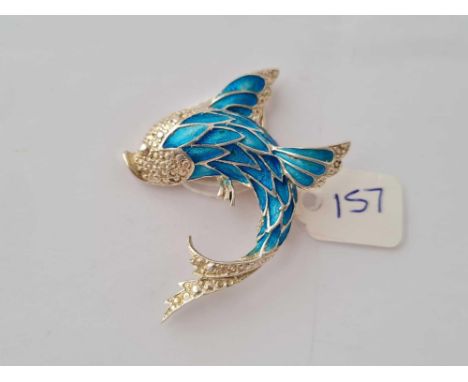 A silver and blue enamel dolphin brooch 