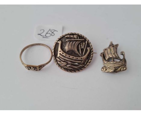 Carrick jewellery Ltd – a silver ring and 2 silver Viking ship brooches