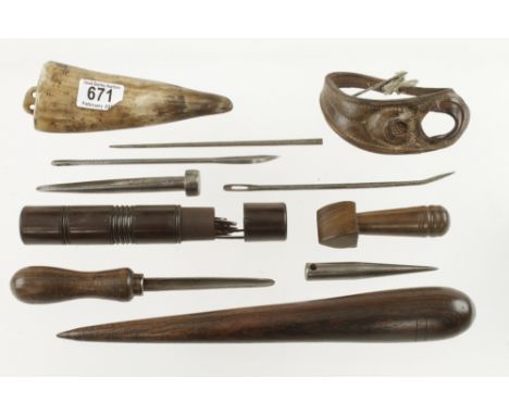 A sailmakers 12" rosewood fid, a sailor's palm, lignum seam rubber, grease horn, needle case with needles and 5 other related
