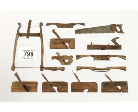 A miniature set of 12 carpenters tools as illustrated, the moulding planes 2 3/8" long G+