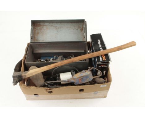 A tin case of spanners and other tools 