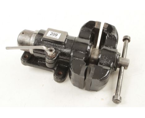 A rare SWINDENS patent No 14 revolving head vice with 4" flat and 2 5/8" concave pipe jaws. Advertised as 'The Most Versatile