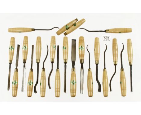 A probably unused set of 19 carving tools plus 2 spare handles by H.TAYLOR Acorn Brand F