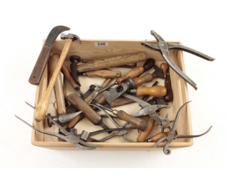 A kit of leather workers tools G+