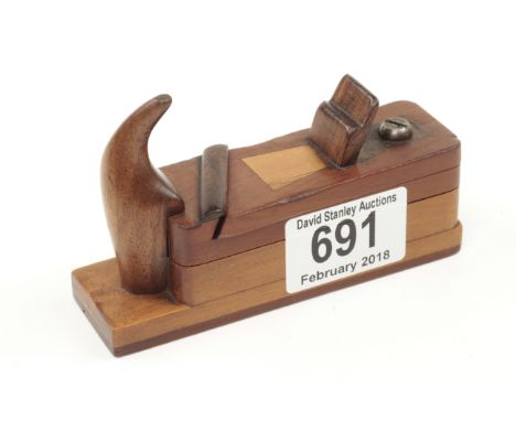 An early unusual French carpenters "secret" snuff box in the form of a plane in boxwood, cormierwood, rosewood, ebony and ivo