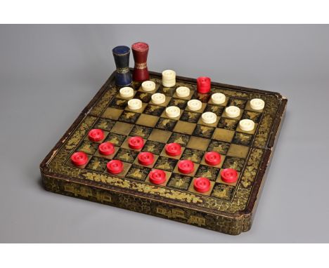A CHINESE EXPORT LACQUER BACKGAMMON SET, LATE 19TH CENTURY. Decorated in black and gold lacquer with panels of seated figures