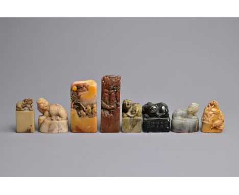 A GROUP OF CHINESE SOAPSTONE SEALS, 19/20TH CENTURY. Of various forms, four surmounted by animals together with two boulder f
