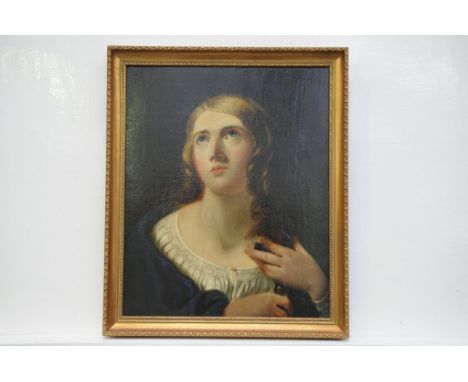 An 18th Century Italian portrait of a female Saint,Typically painted in blue Lapiz robe, unsigned, oil on canvas, 52cm x 41cm