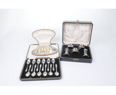 A Continental silver-gilt and enamel set of six tea spoonsEach spoon enamelled in a different colour, over engine turned deco