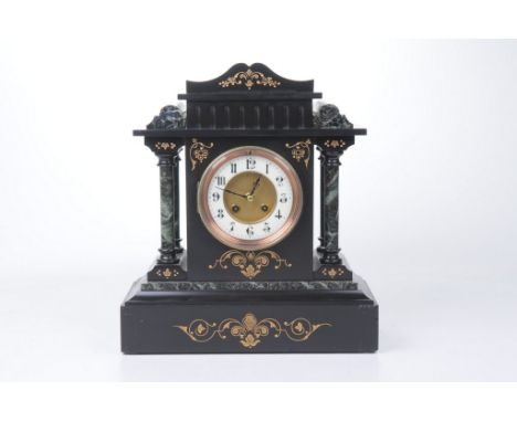 A Victorian black slate mantel clockThe architectural case with green variegated marble Corinthian Columns, the glazed dial w