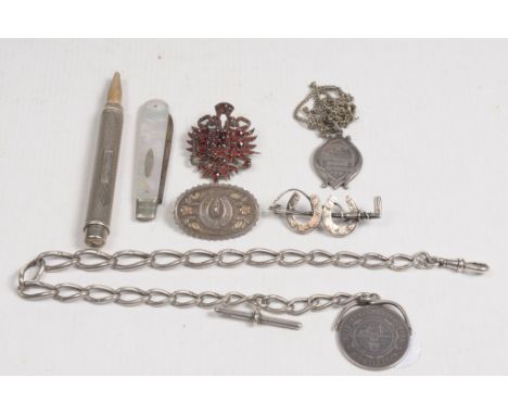 A silver Albert chainWith T-bar and a shilling fob attached, together with, two Victorian silver bi-coloured brooches, with h