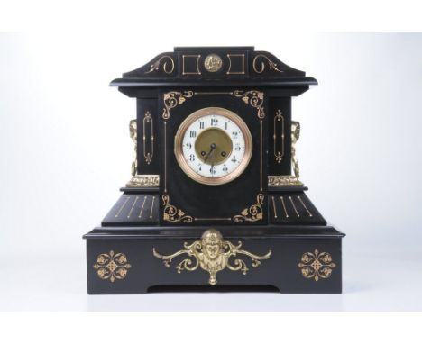 An Impressive Victorian black slate mantel clockThe architectural casing inscribed with gilt scroll designs and spandrels, fl