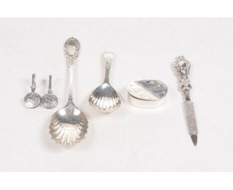 A George III silver caddy spoonInitialled, with ribbed bowl, and bright-cut decoration to the stem, London 1787, together wit
