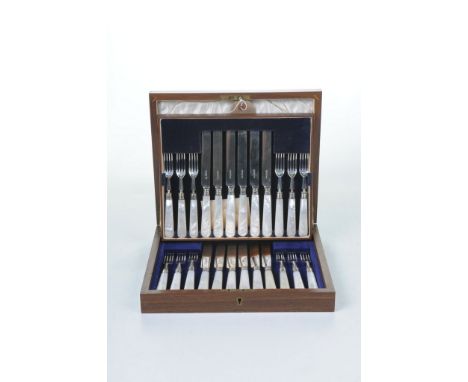 A silver and mother of pearl matched dessert service for twelve settingsWith plain blades, tines and handles, contained withi