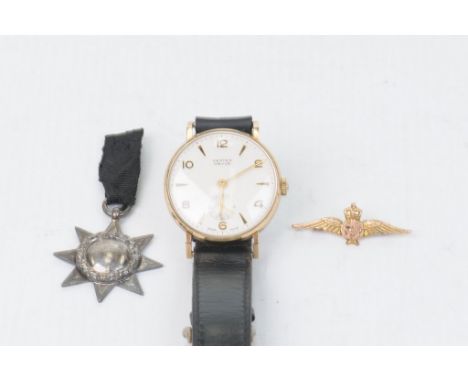Vertex: A 9ct gold presentation manual wind presentation watchTo black leather strap, inscribed, together with, a 9ct gold RA