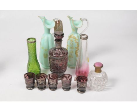 A Collection of early 20th Century glasswareTo include an iridescent green glass vase with silver collar, 18cm high, a shaded