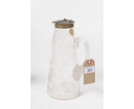 A Victorian etched decanter, Circa 1870The decanter or water jug with tapered straight sides and flanked by a reeded loop han