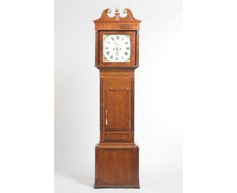 A George IV oak and mahogany cased longcase clock With a gilt embellished swan neck pediment , above two reeded columns flank