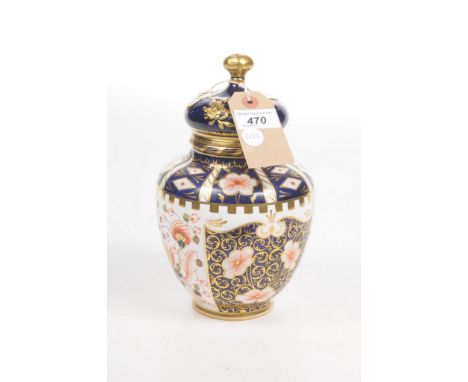 A Royal Crown Derby 'Imari' pattern jar and coverOf rounded form, surmounted by adorned cover with gilt ball finial, with all