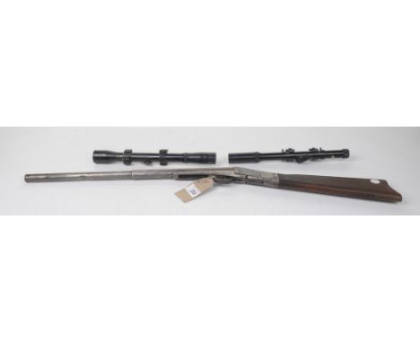 A Daisy .177 calibre air rifle45.5cm barrel, wooden stock, two telescopic sights and a gun bag. CONDITION REPORT: Lot 252 - M