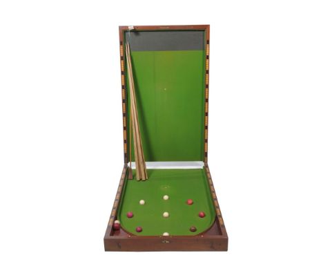A Victorian mahogany folding Bagatelle boardWith a green baize lined interior complete with balls and cues, length open 244x7