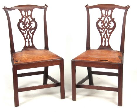 A PAIR OF GEORGE III MAHOGANY CHIPPENDALE STYLE SIDE CHAIRS with scrolled fold-over corners above  vase-shaped pierced back s