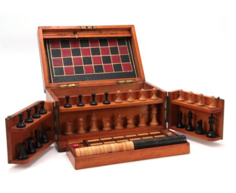 A VICTORIAN MAHOGANY GAMES COMPENDIUM WITH JAQUES MONOGRAM having a hinged fold-out front and lid enclosing a fitted chess se