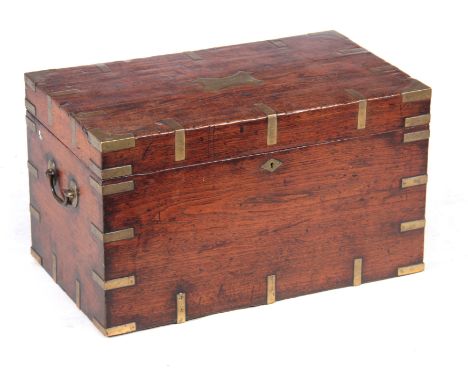 AN 18TH CENTURY CAMPHORWOOD OFFICERS TRUNK with brass corners, strapwork and fitted side handles; with inlaid name plaque A L