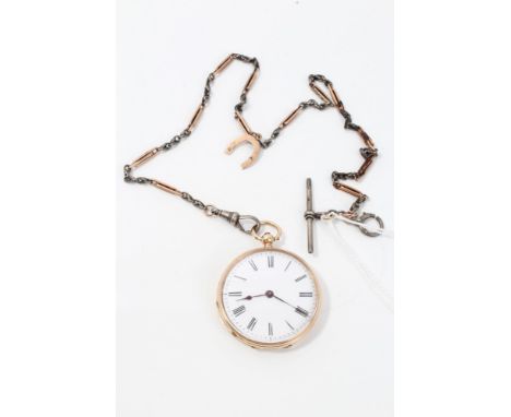 Late 19th century Swiss fob watch with keywind movement, white enamel dial in Swiss gold (14k) case, 36mm diameter, suspended