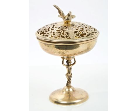 George V silver gilt pot pourri vase of circular form, with slip-in domed cover with pierced floral decoration and dove finia