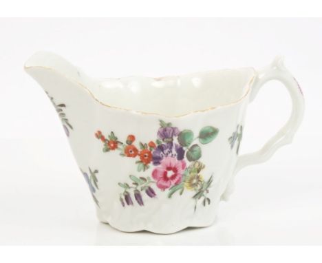Mid-18th century Worcester polychrome cream jug with moulded leaf decoration and painted floral sprays, 11cm   CONDITION REPO