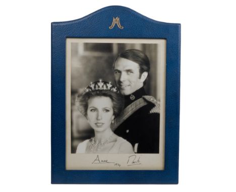 HRH Princess Anne and Captain Mark Phillips - signed presentation portrait photograph of The Royal Couple, signed in ink on m