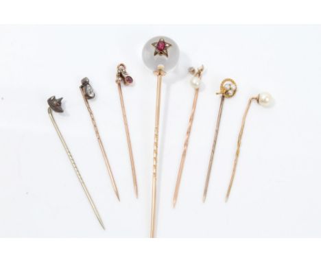 Group of seven antique stick pins - to include 19th century Russian stick pin with spherical crystal ball mounted with a ruby