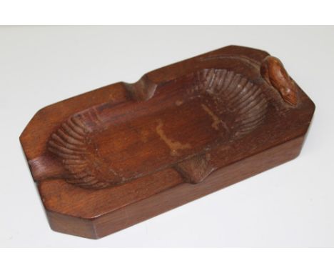 Robert 'Mouseman' Thompson of Kilburn carved oak ashtray of canted rectangular form, with signature mouse to one end, 21cm wi