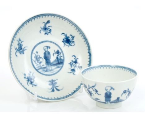 18th century Worcester blue and white tea bowl and saucer with printed Chinaman in garden with fence - blue crescent marks