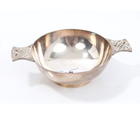 Contemporary Scottish silver quaich with Celtic bird decorated handles, on circular foot (Edinburgh 1972), maker - F. H.  All