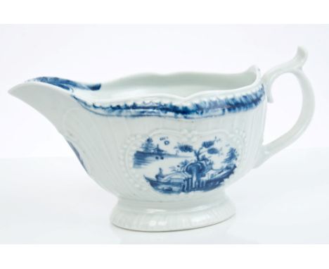 18th century Worcester blue and white sauce boat with moulded cartouches and scroll handle, painted Cannonball pattern and la