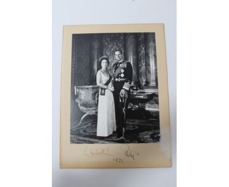 HM Queen Elizabeth II and HRH The Duke of Edinburgh - signed presentation portrait photograph, signed in ink on mount - 'Eliz