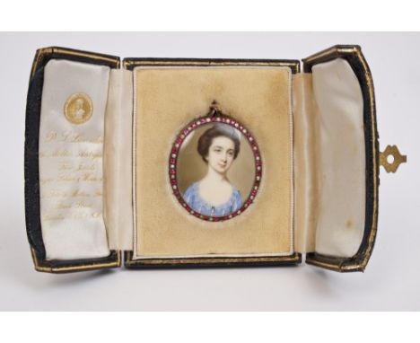 John Smart (1741 - 1811), watercolour on ivory - miniature portrait of a lady, in blue dress with pearl-drop front, signed wi