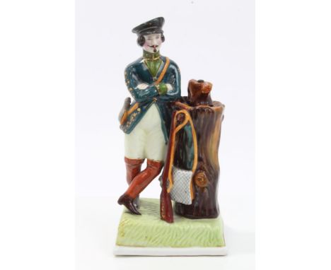 Imperial Russian porcelain figure / table lighter of a huntsman with sporting gun and game bag, resting on a tree trunk, cont