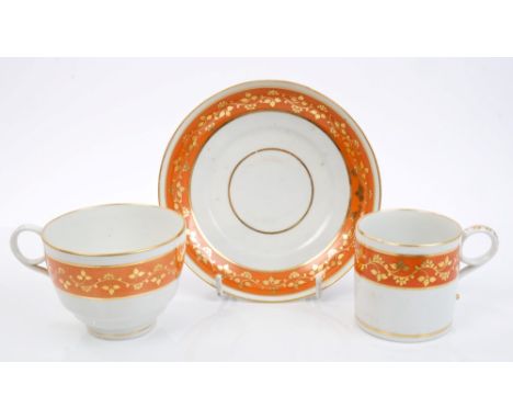 Late 18th century Barr Worcester trio with orange and gilt floral bands, circa 1800