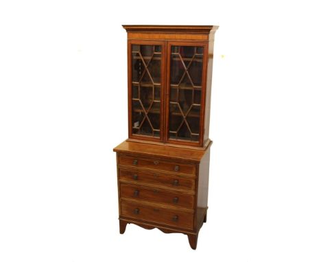 Good small size Edwardian mahogany and tulipwood inlaid bookcase, the upper section with adjustable shelves enclosed by a pai