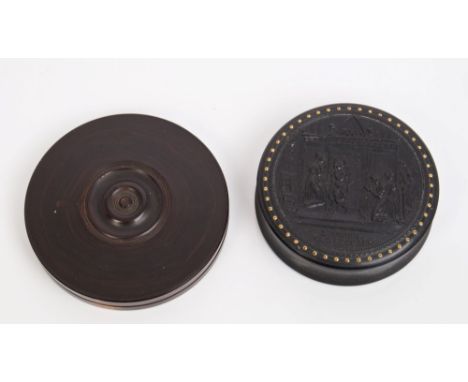 Victorian bois durci pressed circular snuff box with 'L'amour Confesseur' scene to lid and gold piqué work border, 6.5cm, tog