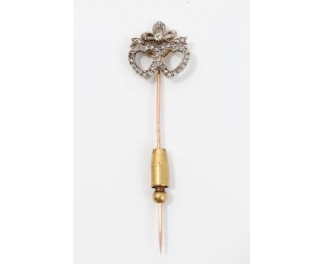 Victorian diamond set stick pin with two interlocking hearts surmounted by a ribbon, set with rose cut diamond in silver sett