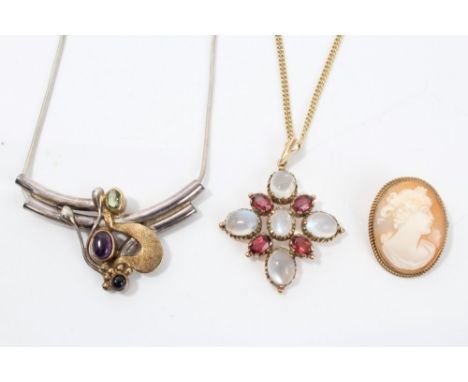 Regency-style garnet and moonstone pendant on chain, silver peridot and amethyst cabochon necklace by Paula Bolton, plus a go