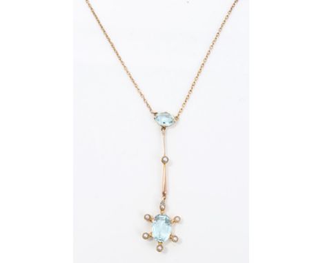 Edwardian aquamarine and seed pearl pendant necklace on trace chain   CONDITION REPORT  Repair to the setting at the pendant 